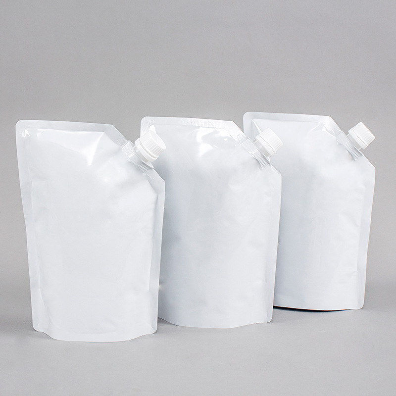 Picture of in stock pure white aluminum foil suction nozzle bag 1L self-standing bag packing bag take-out soup liquid bag wine and beverage packaging bag