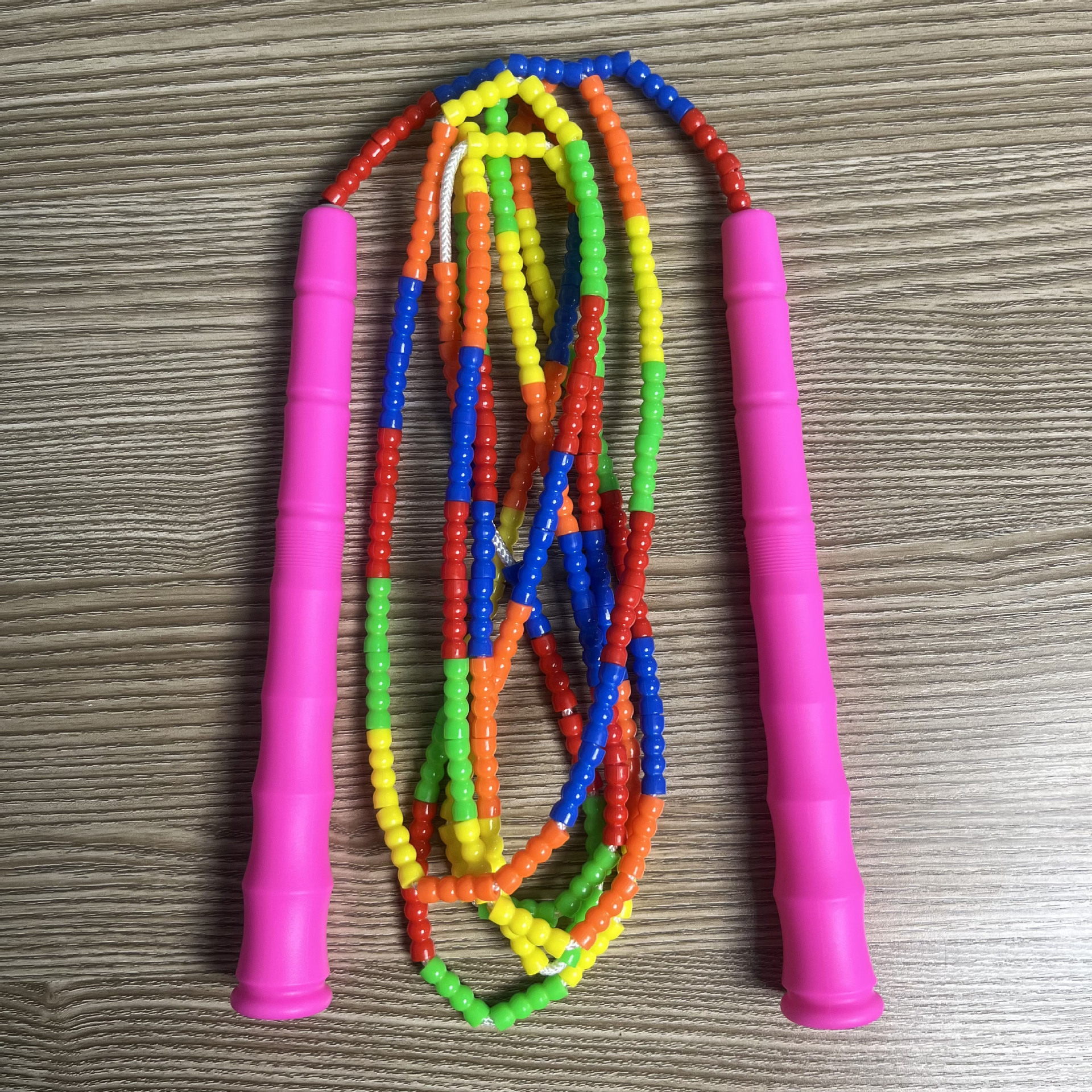 Picture of Manufacturer Wholesale Children's Fitness Sports Pattern Skipping Rope Kindergarten Competition Soft Bead Bamboo Skipping Rope for Primary School Students