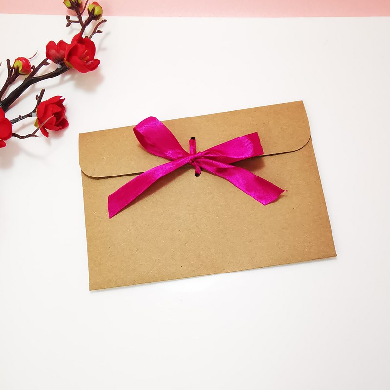 Picture of European envelope Kraft paper style vintage greeting card blessing card packaging bag creative bow CD bag wholesale