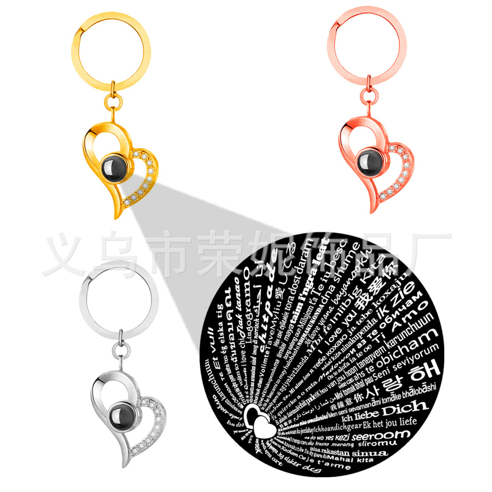 Picture of Tiktok same style hot sale S925 silver necklace 100 languages pendant keychain I love you projection not fade female