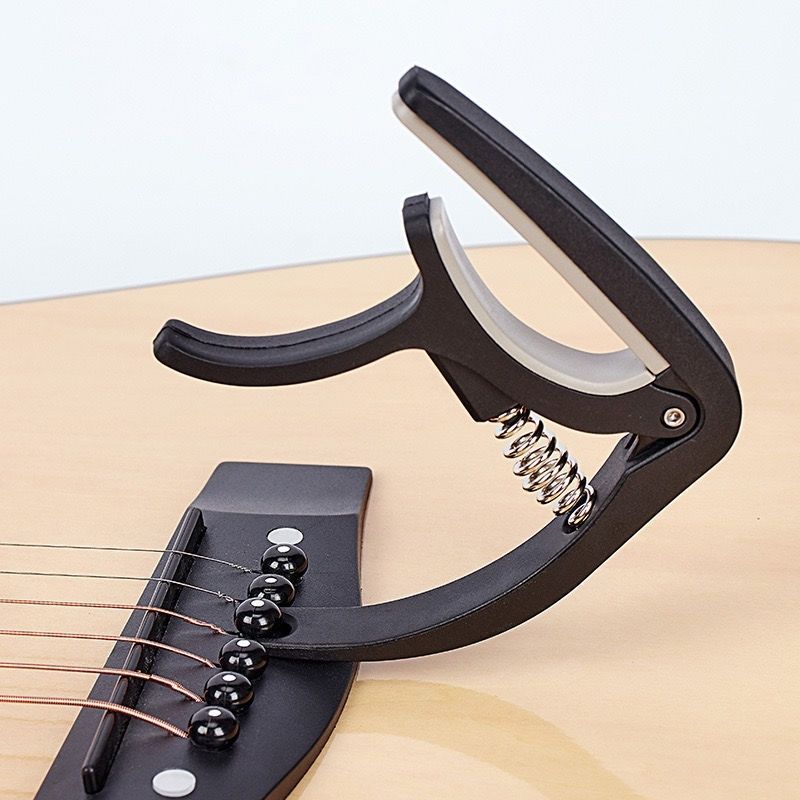 Picture of Guitar Capo, Individually Packaged Plastic Capo, Electric Guitar, One-Clip Dual-Purpose Classical Piano Clip, Guitar Accessories