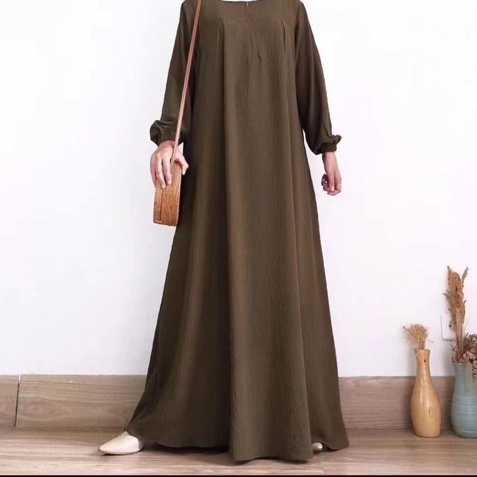 Foreign trade new cross-border Middle East solid color long sleeve zipper round neck dress Muslim dress factory batch in stock