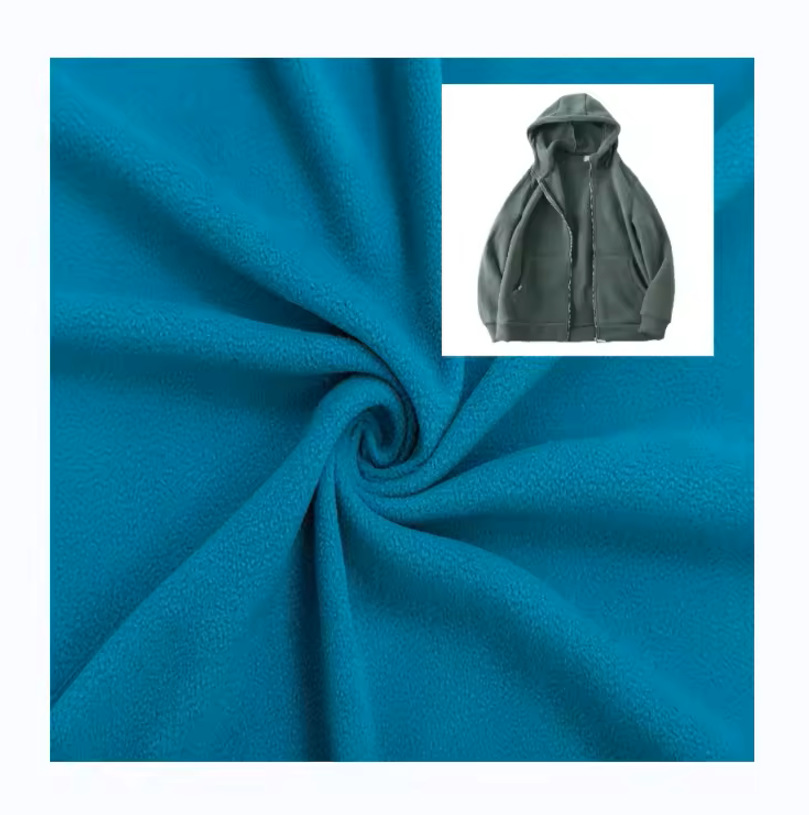 Single brush single shake 150D high weight polar fleece knitted particle flannel fabric trendy brand multi-color polar fleece fabric
