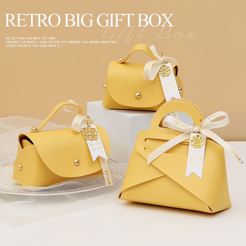 Picture of European Creative Wedding Candy Box Leather Ins Style Satchel Wedding Candy Bag Wedding Souvenir Gift Candy Gift Box