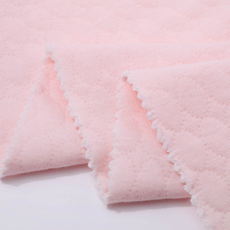 Picture of Oval jacquard air layer fabric autumn and winter baby sweater fashion climbing clothing sleeping bag fabric cotton silk on both sides