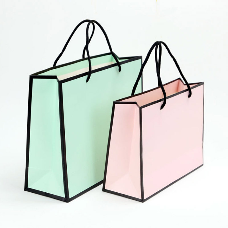 Clothing store handbag gift packaging bag spot simple ins solid color shopping bag pink high-grade paper bag