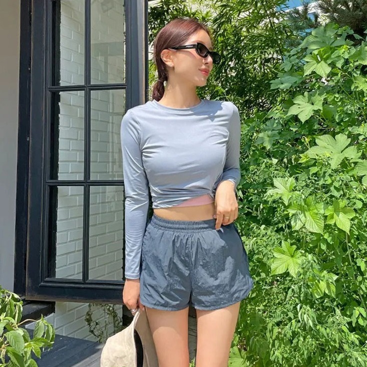 2024 new gray long sleeve conservative high waist tight slimming sports goddess hot spring holiday European and American split swimsuit