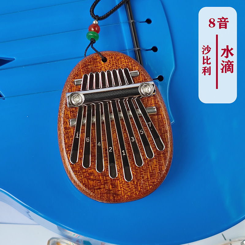 Picture of Mini Thumb 8-Tone Mini Calimba Crystal Transparent Five-Finger Portable Beginner's Finger Instrument