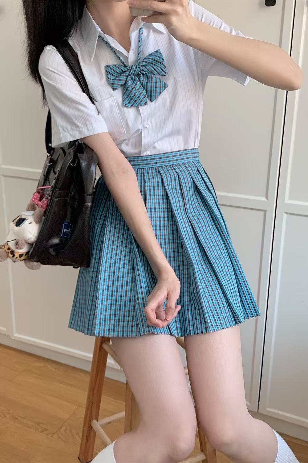 Picture of New JK Uniform suit Wholesale Pepper Plaid Skirt Campus College Plaid Pleated Skirt Sweet Half Skirt