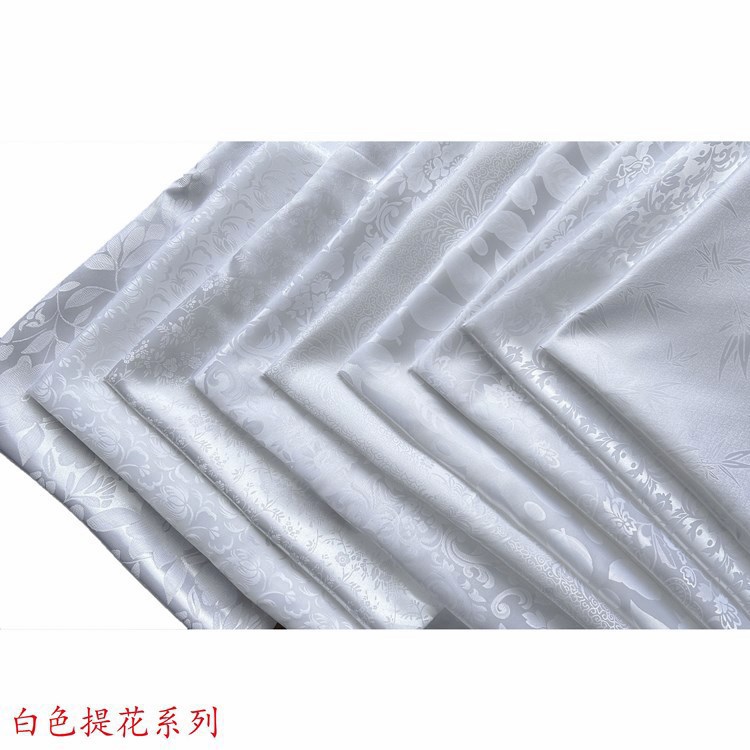 in stock supply white jacquard cloth three-dimensional concave and convex flower jacquard clothing fabric tablecloth placemat fabric wholesale