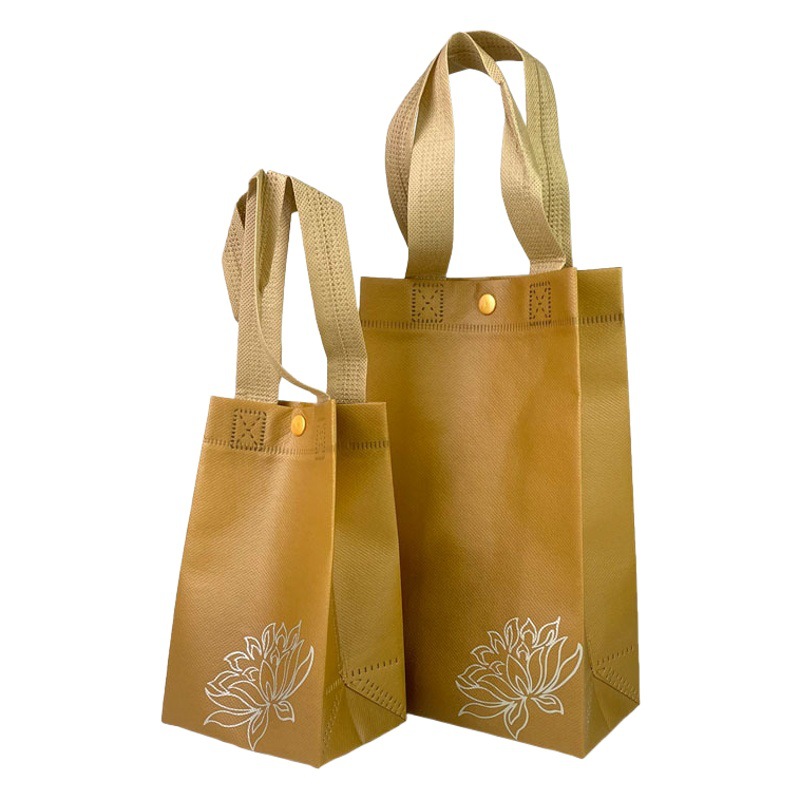 Non-woven environmental protection bag Lotus handbag in stock lotus pattern red gold jewelry packaging bag wholesale