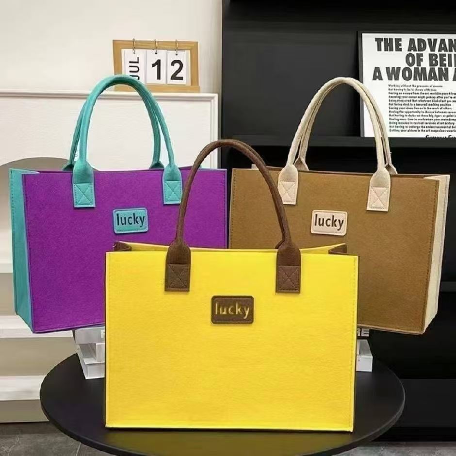 New high-end feeling double color felt bag lucky simple handbag fashion tote bag hand shopping bag