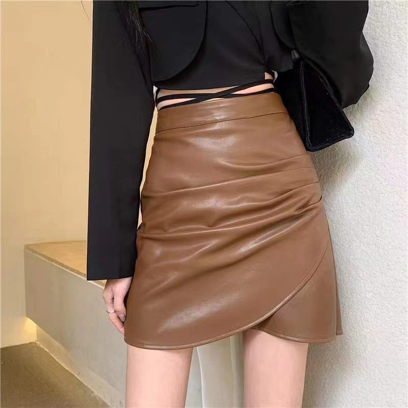 Irregular hip skirt high waist A- line 20 black leather skirt 23 autumn and winter new small skirt for women Spring