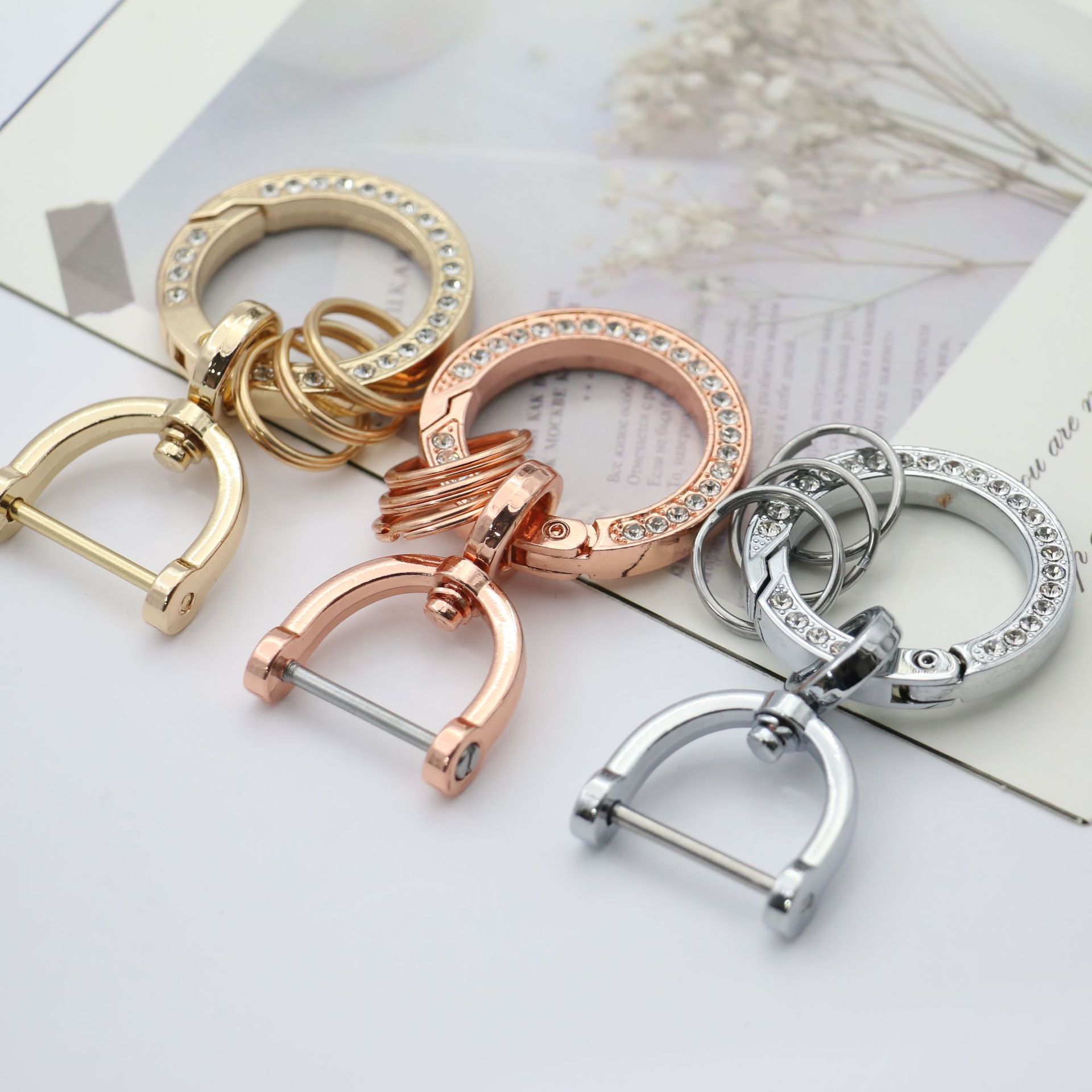 Picture of Diamond-Encrusted Creative Car Keychain with Anti-Lost Phone Number Plate Exquisite Key Chain Key Ring Jewelry Factory Wholesale