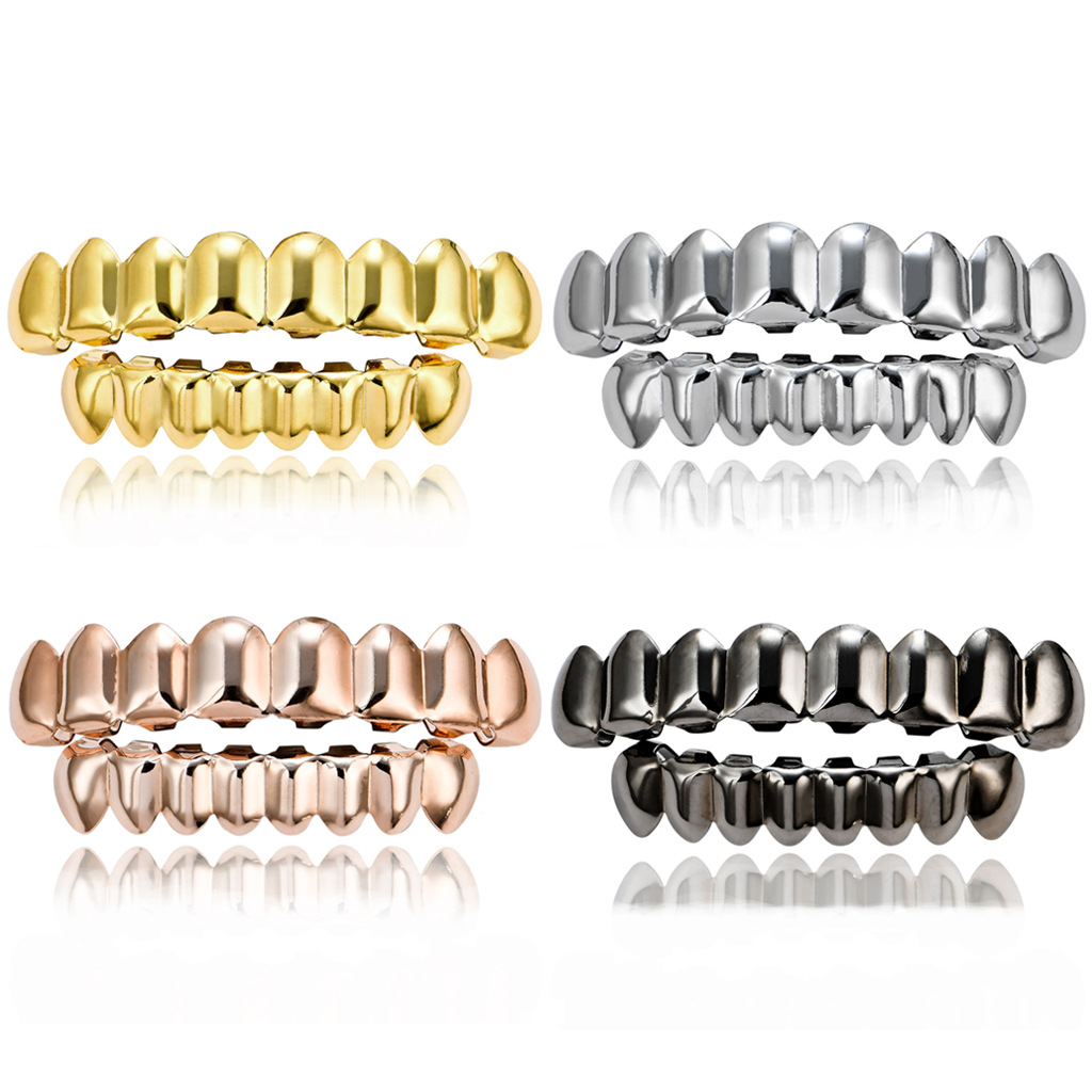 Picture of Europe and the United States HIPHOP hip-hop gold braces upper teeth 8 lower teeth 8 real gold plating 18K gold hip-hop braces wholesale