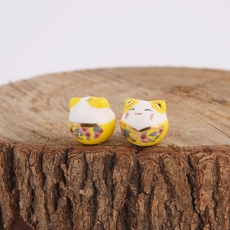 Picture of Japanese-style ceramic lucky cat beaded vertical hole cat pendant jewelry mobile phone chain ceramic cat bracelet DIY loose beads wholesale
