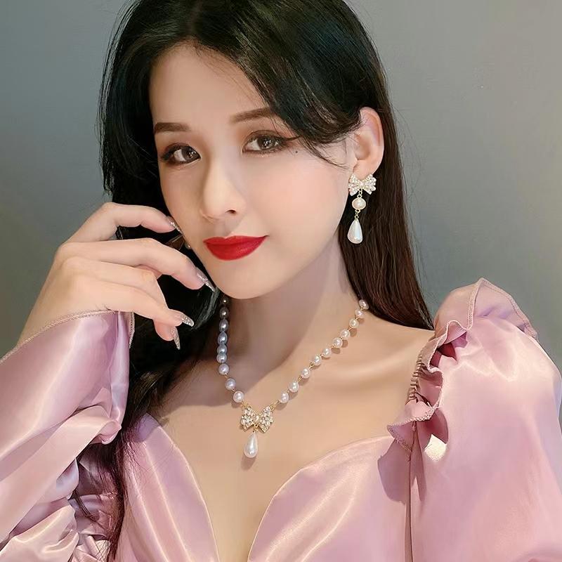 Pearl Necklace Live European and American Design Sense Bow Women's Color-free Pendant Collarbone Chain Long Summer Explosions