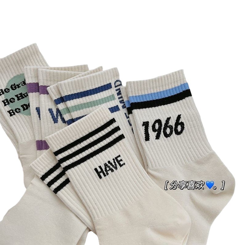 Women's Mid-calf socks autumn and winter ins fashionable student stockings South Korea Japanese striped sports letter stockings