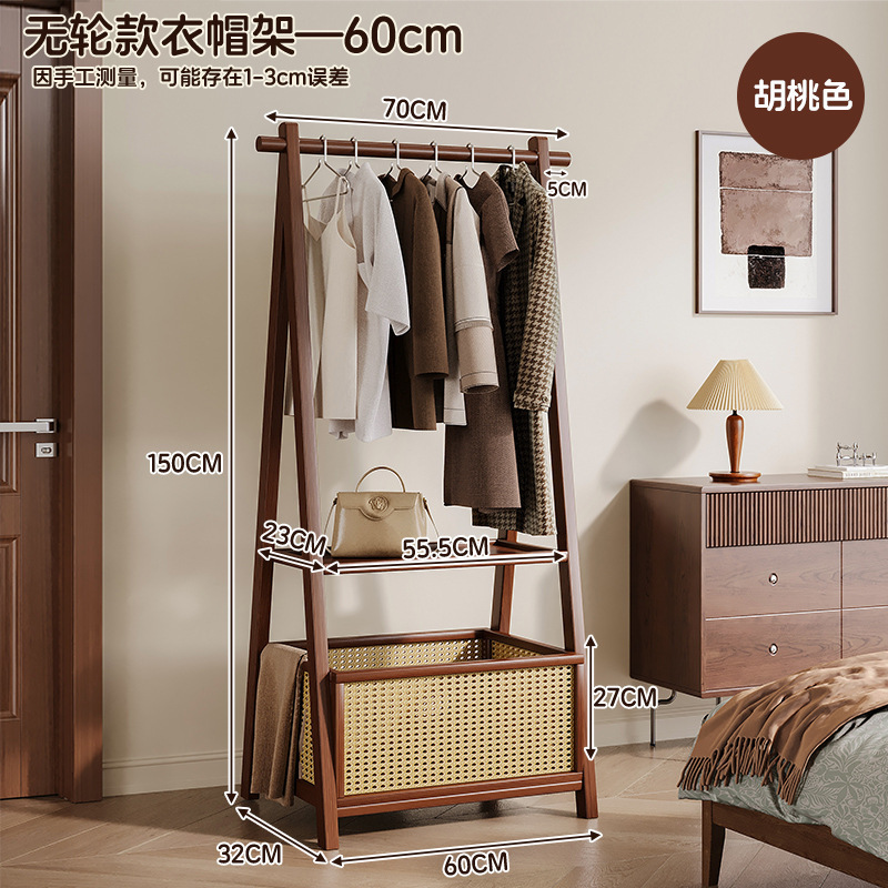 Picture of Vertical hanger floor simple coat rack rack for hanging clothes in a home room is foldable and durable drying rack