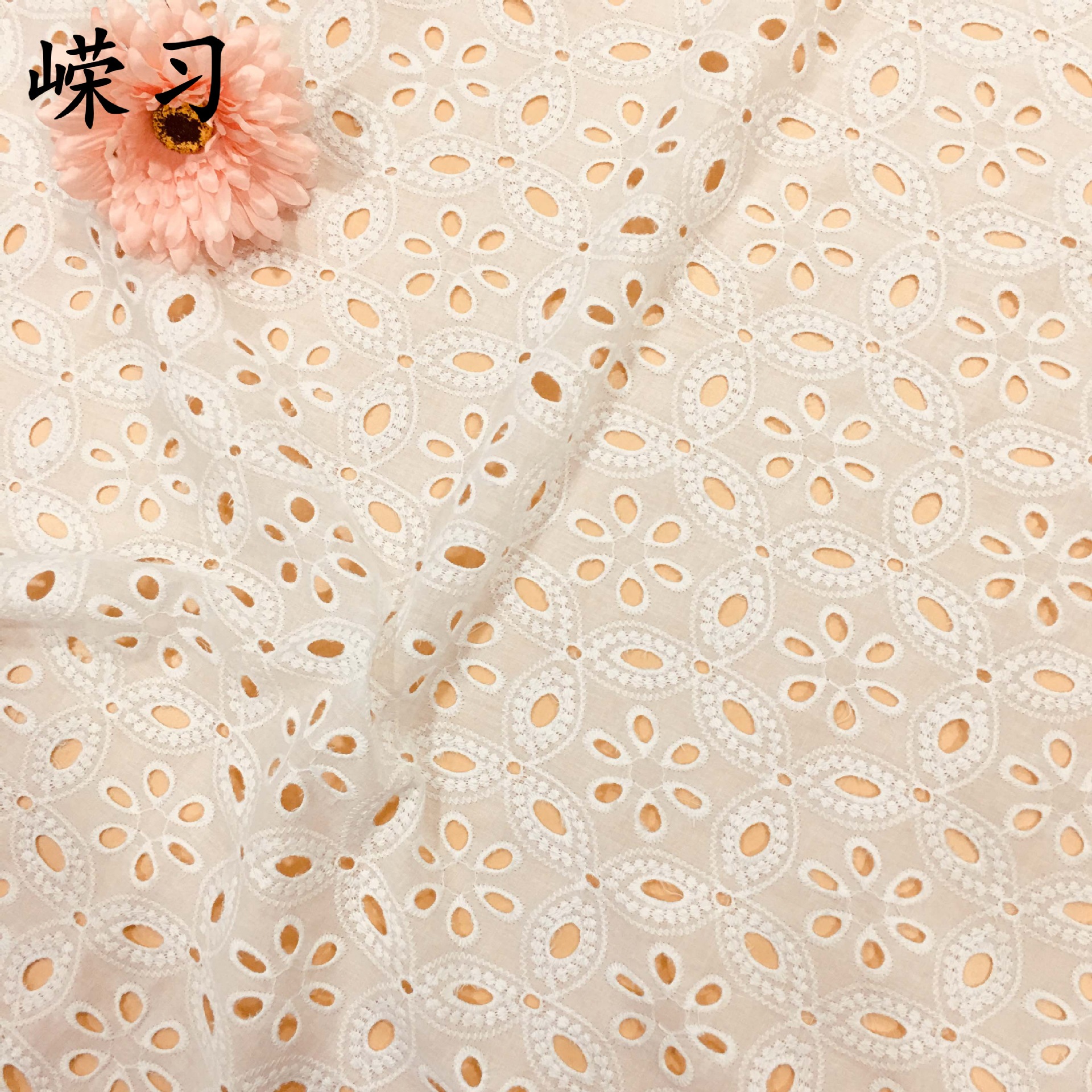 New manufacturer in stock cotton large machine hollow embroidered fabric perforated embroidered women's clothing dress embroidered fabric