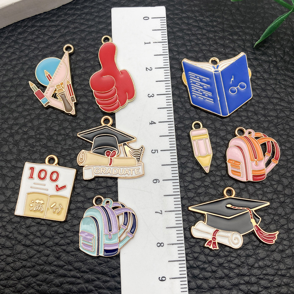 Picture of Cross-border DIY accessories alloy oil drop graduation season examination bachelor cap schoolbag size pen key chain pendant pendant