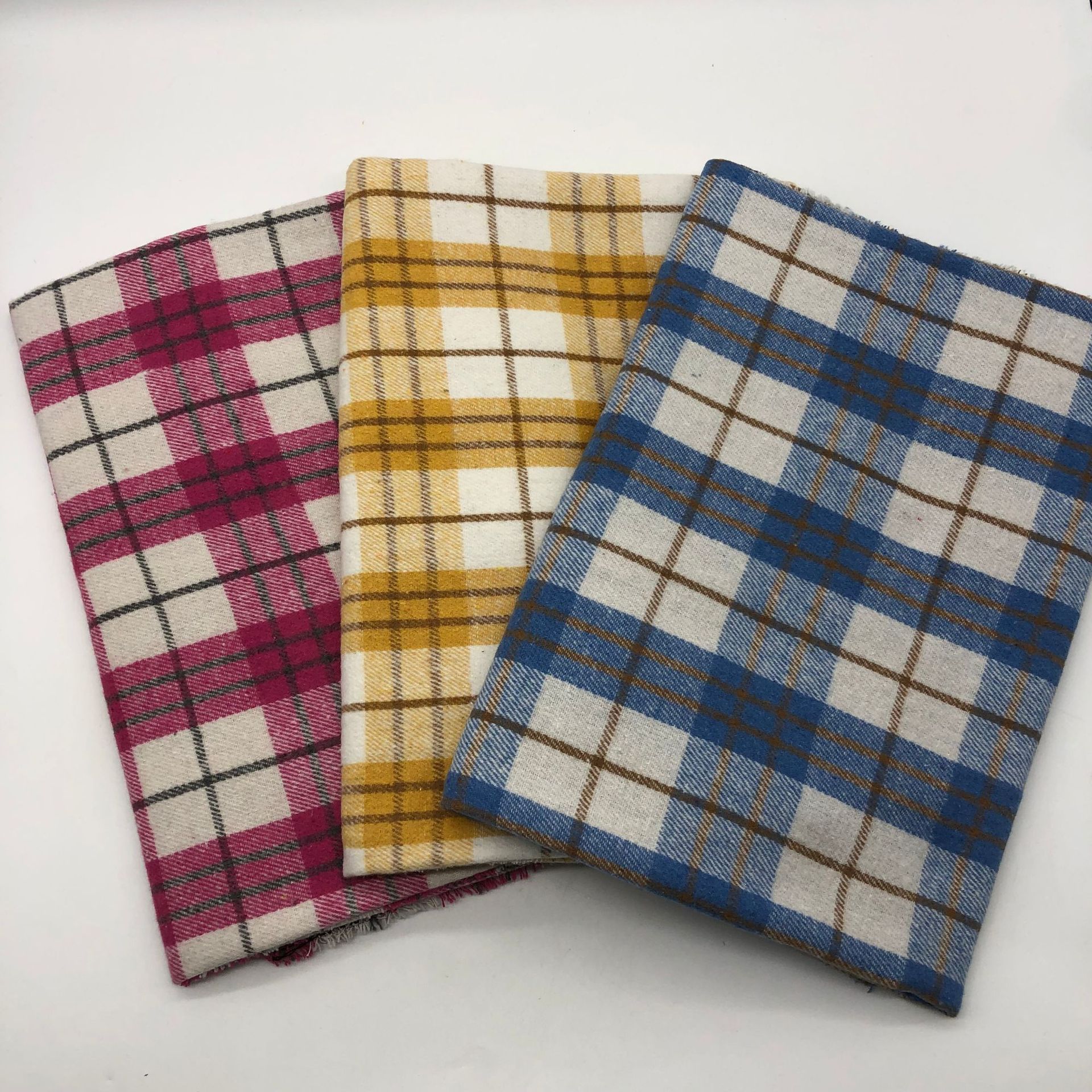 Polyester cotton imitation woolen brushed dyed plaid fabric autumn and winter children's fashion women's shirt fabric in stock