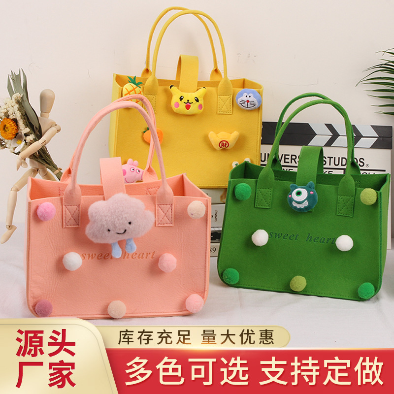 Picture of 2022 felt cartoon handbag hand bag gift bag Net Red full moon wine birthday gift bag wholesale