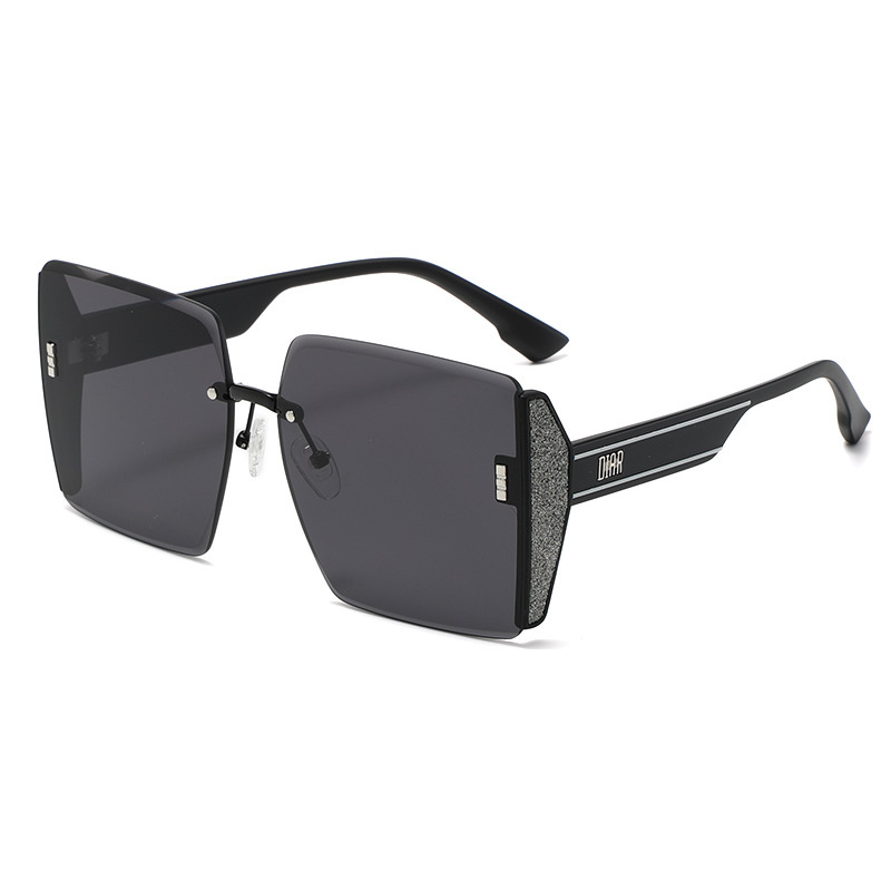 Picture of Em Home 2025 New Frameless Sunglasses Women's Glitter Mirror Edge Anti-Uv Big Face Slimming Live Broadcast Sunglasses