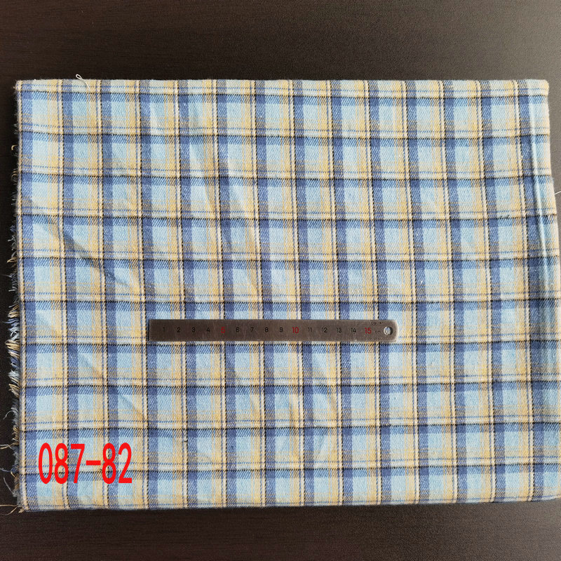 Picture of in stock brushed plaid fabric spring and summer women's shirt cloth 21 polyester cotton woven flannel plaid lining