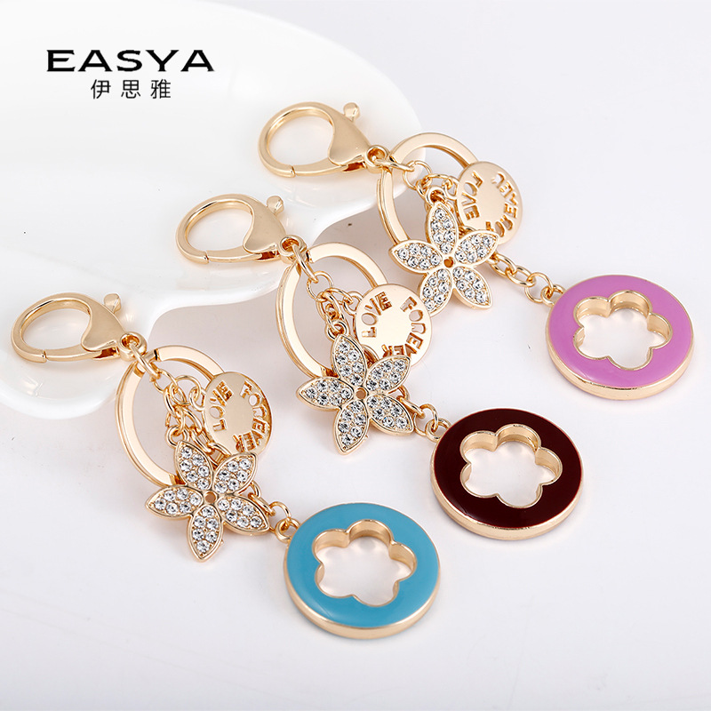 Korean-style creative diamond dripping oil five-leaf clover key chain fashion girl bag metal pendant car key chain