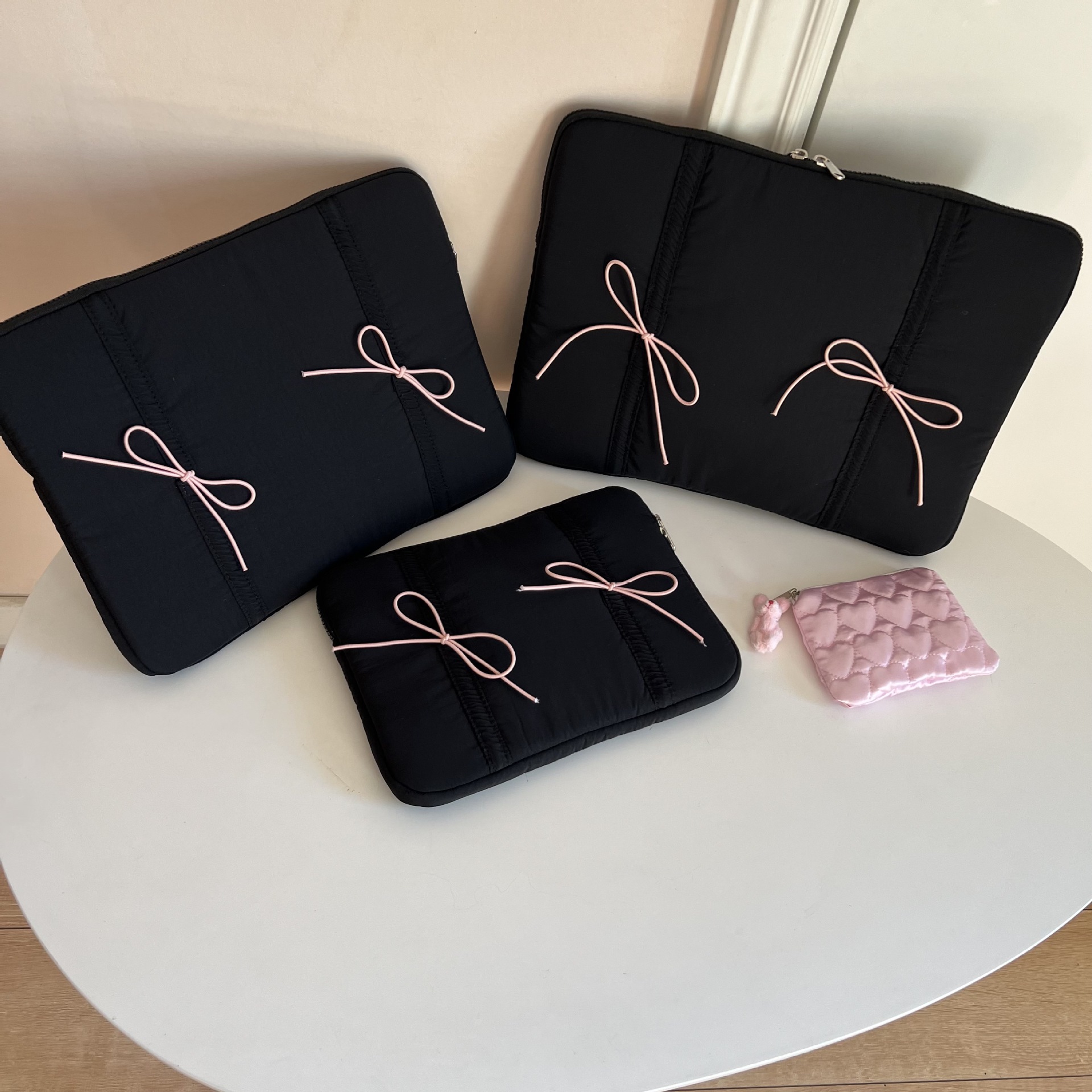 Picture of Cross-border South Korea tablet bag ins wind elastic tie bow 11/13/15 inch notebook liner bag