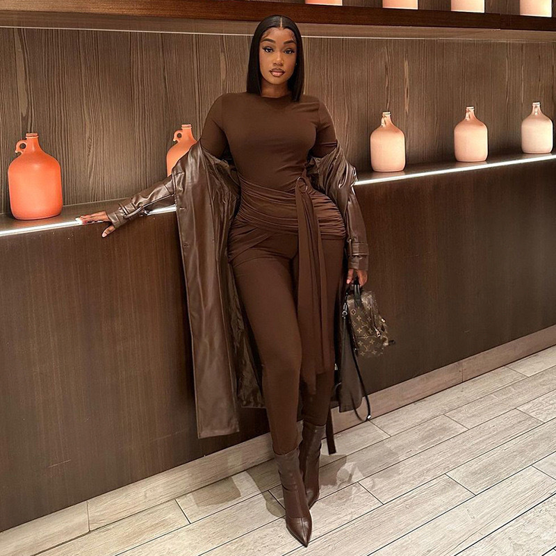 Round neck solid color stitching lace-up metal buckle long sleeve jumpsuit fashion casual tights women manufacturers wholesale