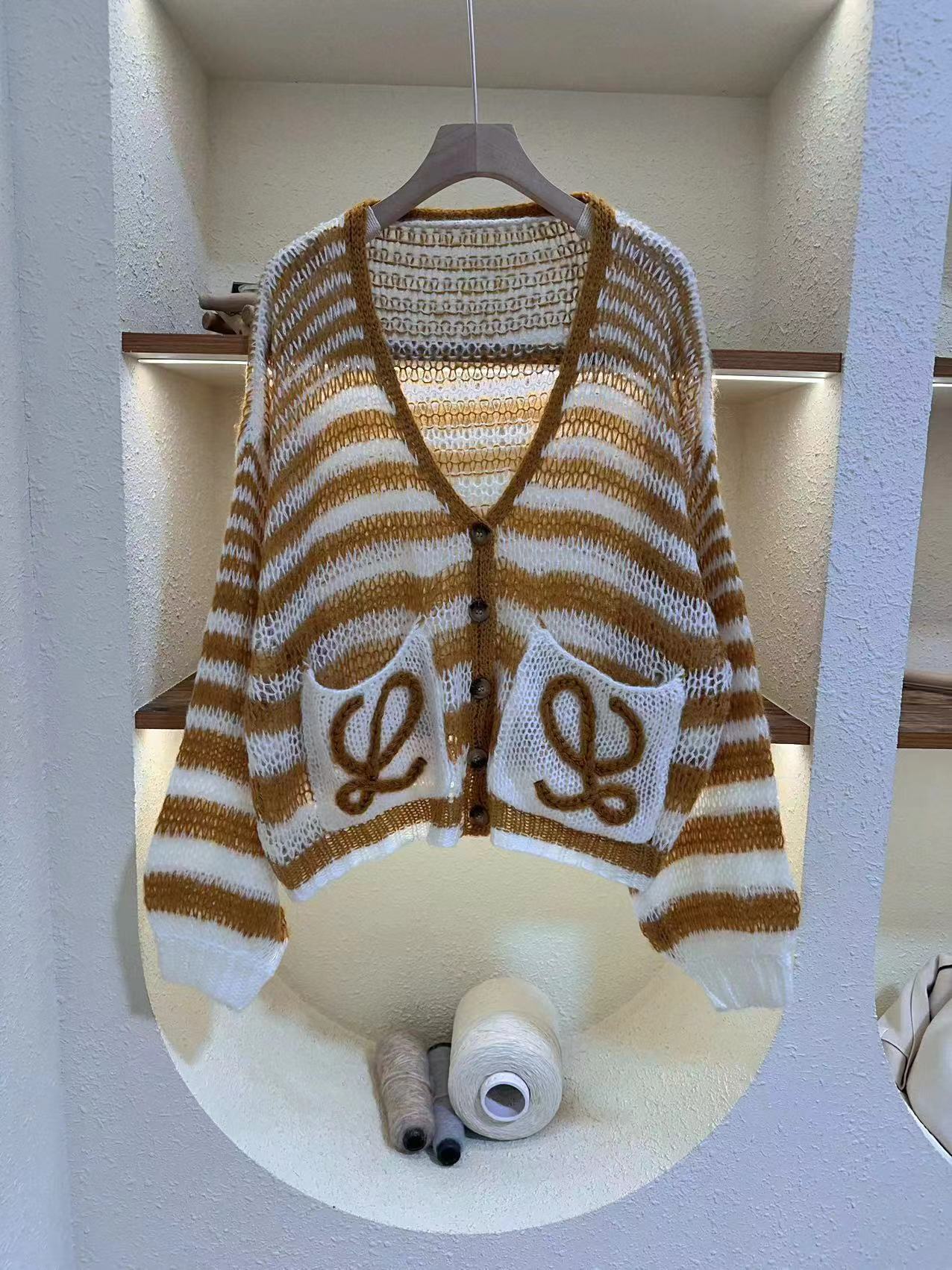 Picture of Spring and Autumn Fresh Lazy Loose Knitted Cardigan Top New Striped Contrast Color Hollow V-Neck Sweater Jacket for Women