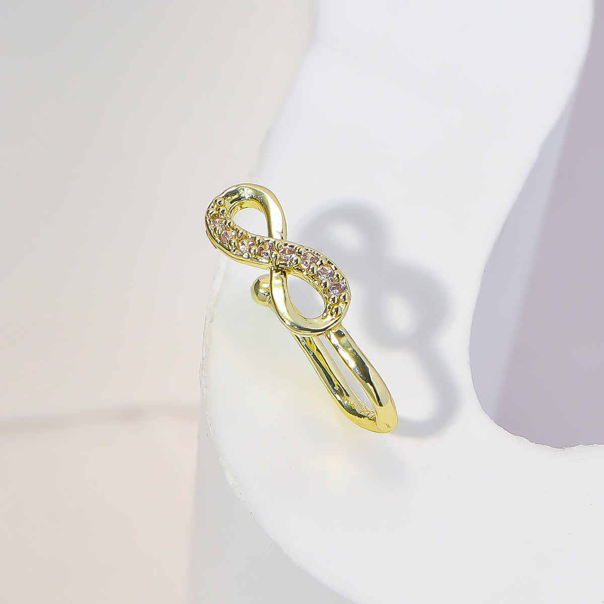 Picture of A Nose Clip with a Sparkling Elegant, an 8-Shaped Nose Clip, Micro-Paved Zircon Adjustable Nose Nail, Nose Ring Piercing Jewelry
