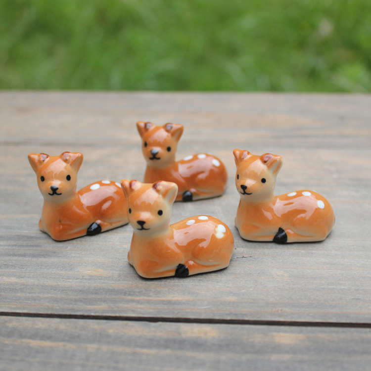 Picture of Ceramic crafts ornaments 12592 deer chopsticks rack sika deer chopsticks rack pen rack factory direct wholesale