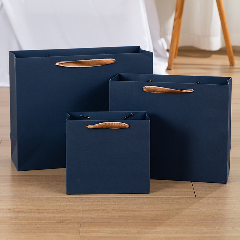 Picture of dark blue Paper Bag Clothing Gift Packaging Handbag High-end Thickened Paper Bag in stock Zhuo Fan Paper Bag
