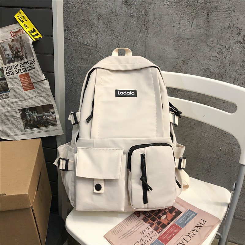 Picture of 2024 new Korean version of simple student schoolbag anti-theft anti-seismic college style backpack computer backpack wholesale LOGO