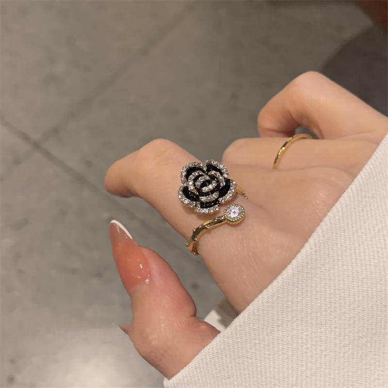 South Korea Dongdaemun black Camellia micro inlaid zircon open ring female high-grade light luxury gentle temperament ring