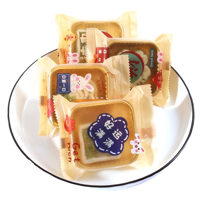 New moon cake packaging bag with support mid-autumn Festival ice skin egg yolk crisp machine seal bag 50g80g 100g flow heart moon cake bag