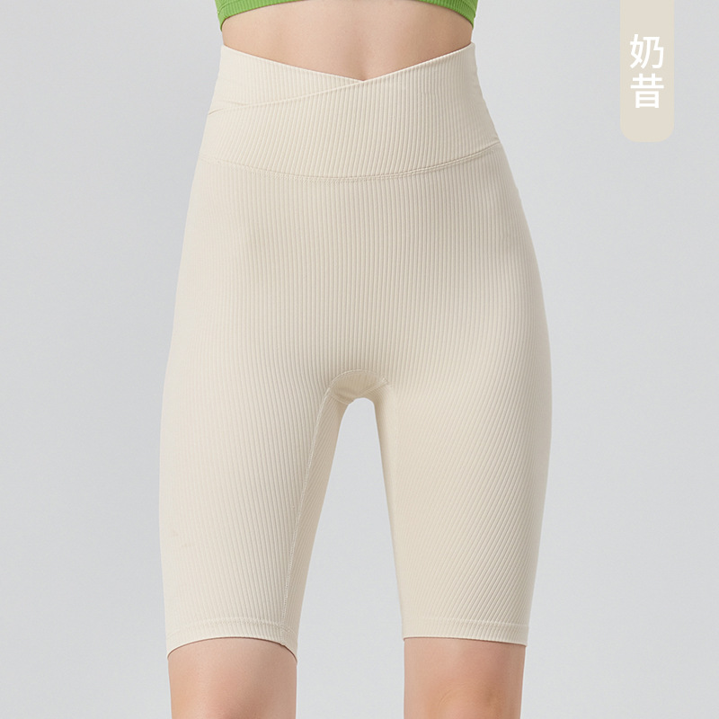 Picture of Cross high waist hip lifting four-quarter pants women's breathable training belly contracting tights yoga sports shorts riding pants