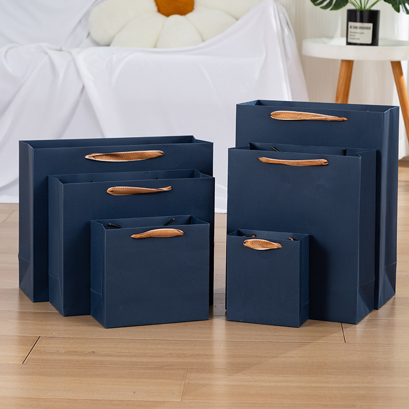 Picture of dark blue Paper Bag Clothing Gift Packaging Handbag High-end Thickened Paper Bag in stock Zhuo Fan Paper Bag