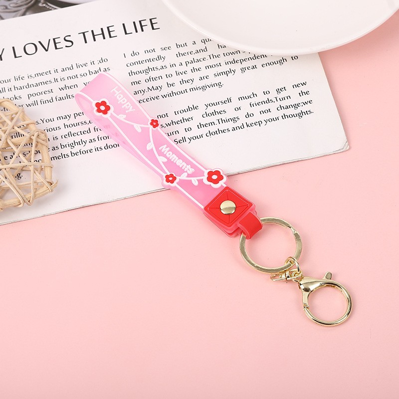 Picture of Transparent candy color soft rubber leather rope keychain small fresh flower creative small accessories cute women's exquisite hand strap