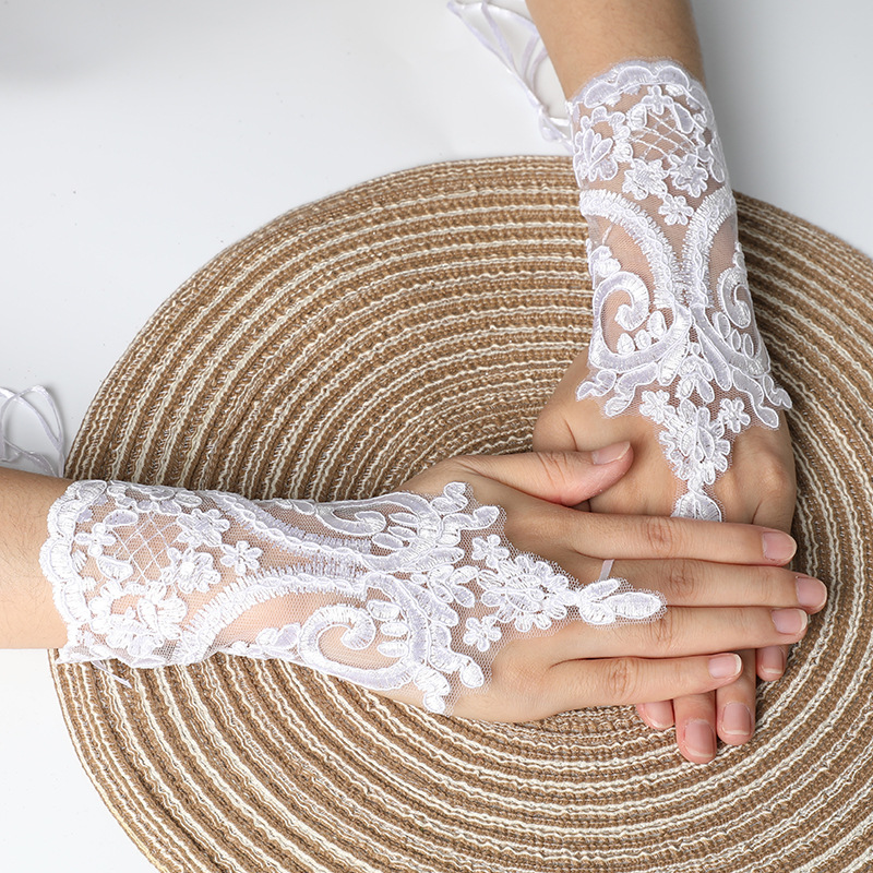 Picture of Hook-Finger Short Mesh Lace Bow Sleeves European and American Bride Wedding Dress Hand Sleeves Short Lace Gloves Wholesale