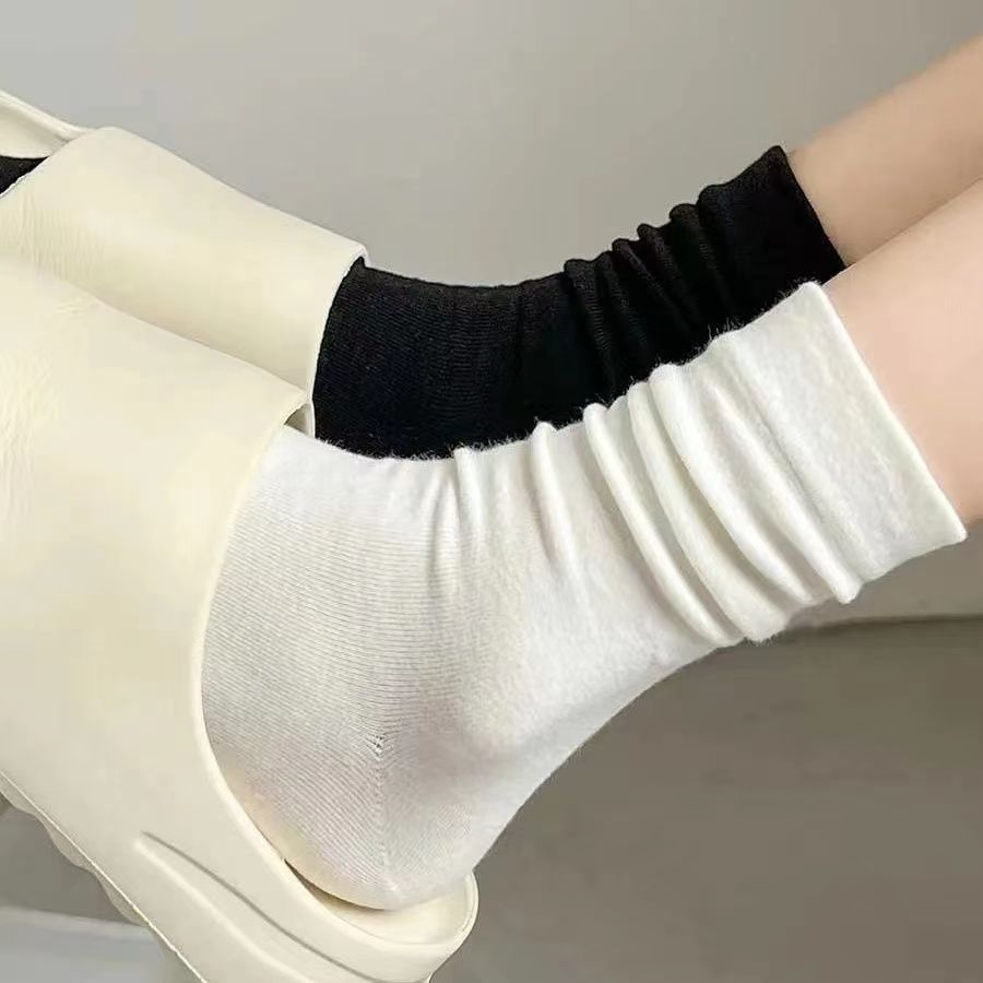 Wholesale White confinement socks women's autumn and winter mid-calf socks ins trendy all-matching Japanese and Korean student socks boneless socks pile socks