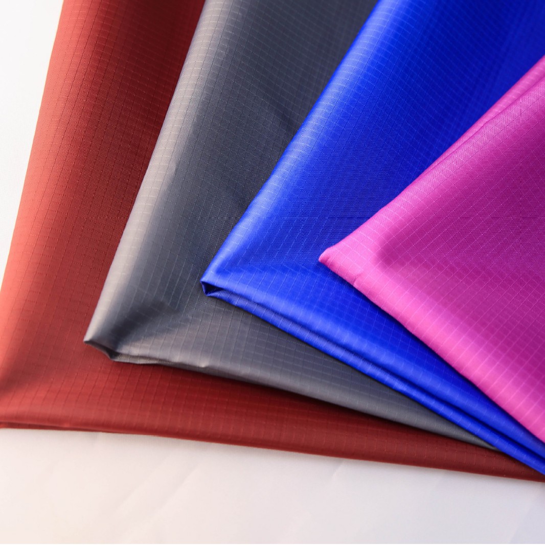 210t Polyester Taffeta Three-Point Waterproof Plaid Fabric in Stock Polyester High-Quality Multi-Color Environmentally Friendly Luggage Waterproof Fabric