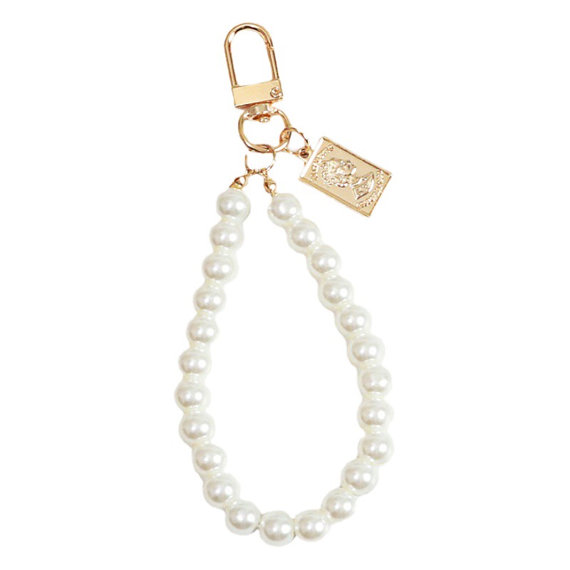 Small fragrant style letter Pearl car keychain Korean Shell Pearl chain bag pendant earphone box Accessories Wholesale