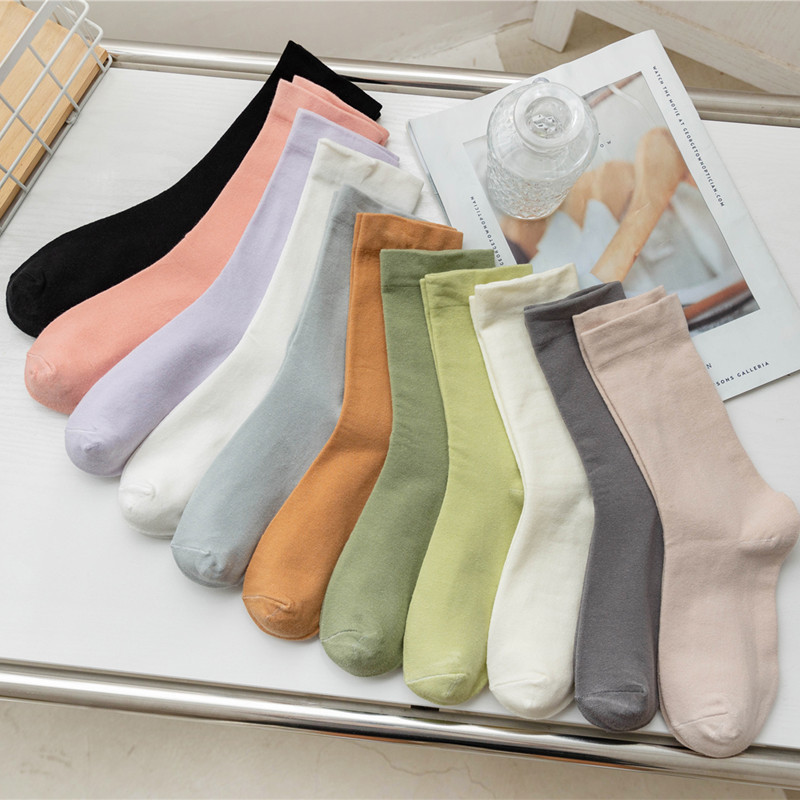 Candy color confinement socks TikTok same style girls' boneless pile socks white ins style trendy socks factory wholesale