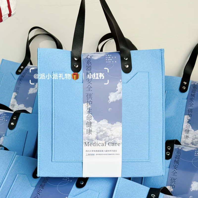 Picture of Little Red Book Portable Felt Bag 2025 Year of the Snake New Year Gift Box New Creative Accompanying Gift Annual Meeting Anniversary of Enterprises