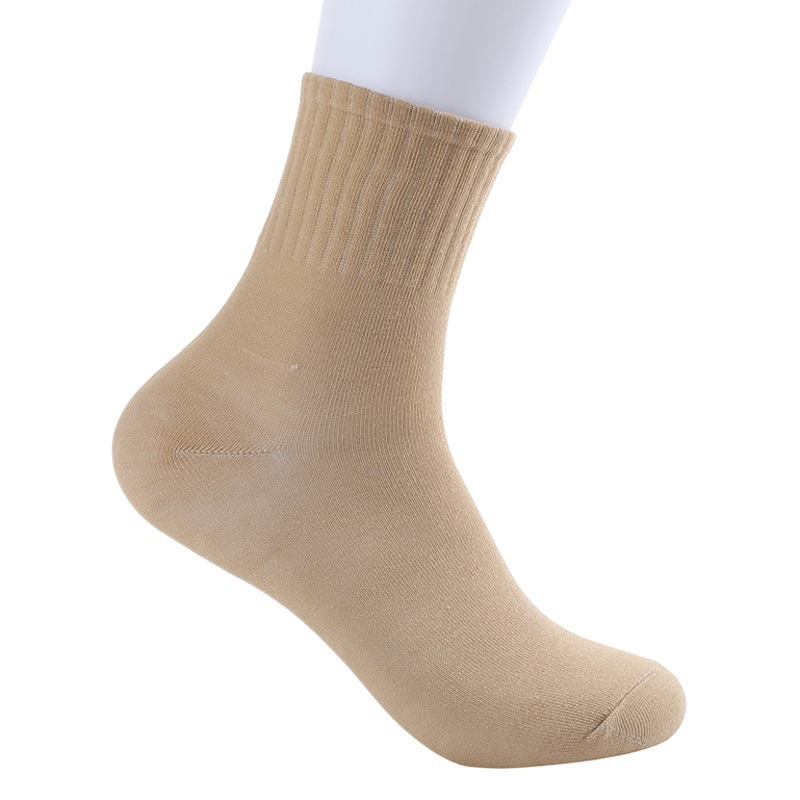 Spring and autumn new solid color tube socks women's Japanese simple vertical cotton stockings Joker sports pile socks wholesale