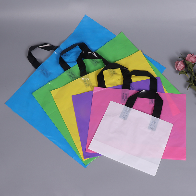 Ready-Made Wholesale Clothing Store Clothing Bags Pe Colored Film Gift Packaging Bags with Logo Printed Plastic Tote Bags